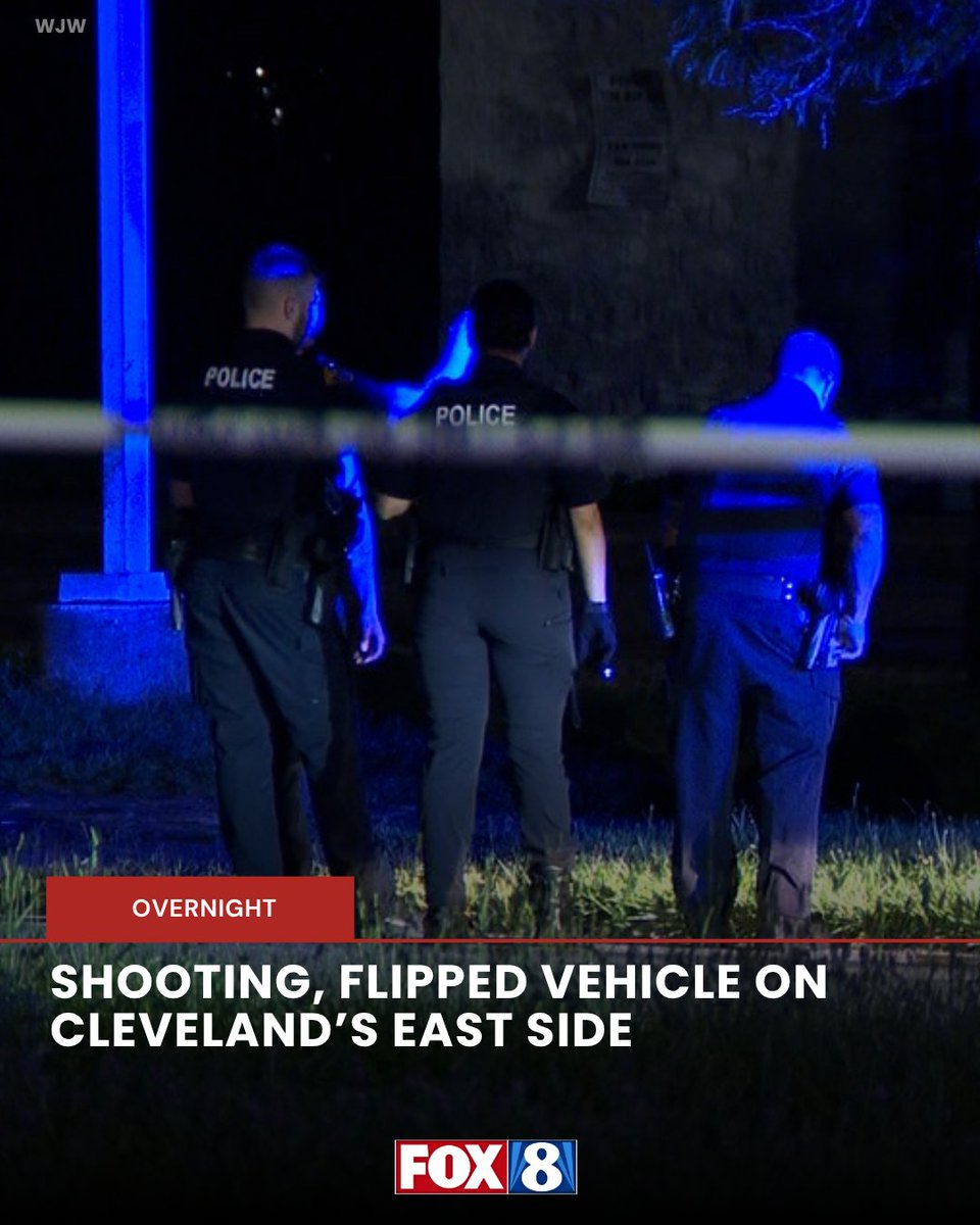 Cleveland police at the overnight shooting and flipped-vehicle scene on the city's east side.