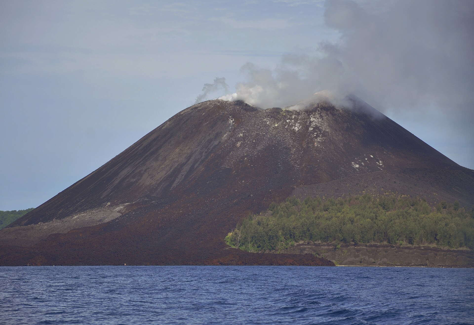 Anak Krakatau ash closes Jakarta's main airport and strands tens of thousands